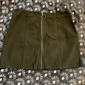 Olive green skirt , zipper in front. Size large
